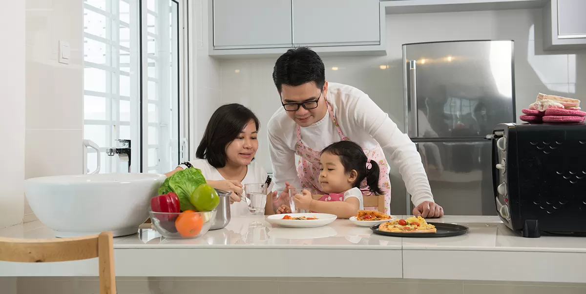 Asian family gathered around dinner